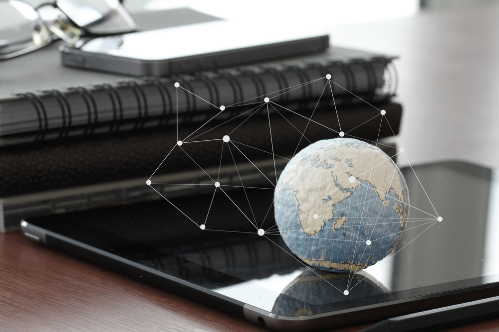 hand drawn texture globe with blank social media diagram on digital tablet computer as internet concept and bokeh exposure